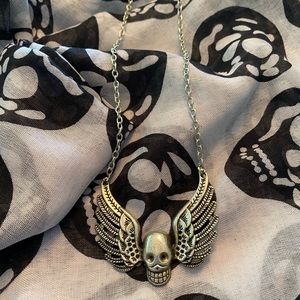 Winged skull necklace
